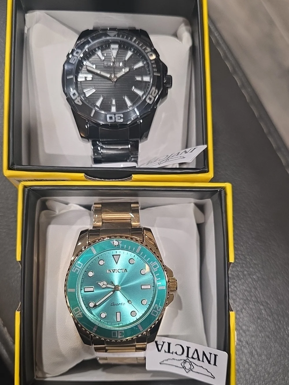 721. Pair Of Men's Invicta Watches